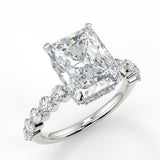Aria Radiant lab diamond engagement ring. With accent stones round and hidden halo.