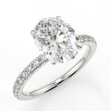 Emma Oval lab diamond engagement ring with four prongs and french pae band