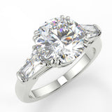 Glada Round cut lab diamond engagement ring with tiger claw prongs and baguettes