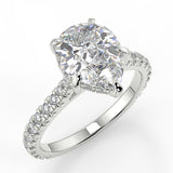 Hazel Pear lab diamon engagement ring with Cathedral shank and Single row French pave setting band