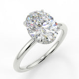 Jacqueline Oval lab diamond engagement ring with plain rounded band setting and a reverse halo