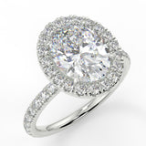 Jazlyn Oval lab diamond engagement ring. Non-cathedral, seamless halo, single row French pave setting band