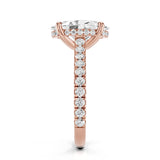 Rose gold ring with a diamond on a white background