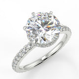 Sophie Round lab diamond engagement ring with reverse halo and french pave band