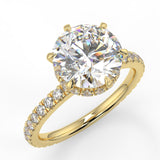 Sophie Round lab diamond engagement ring with reverse halo and french pave band. Yellow Gold