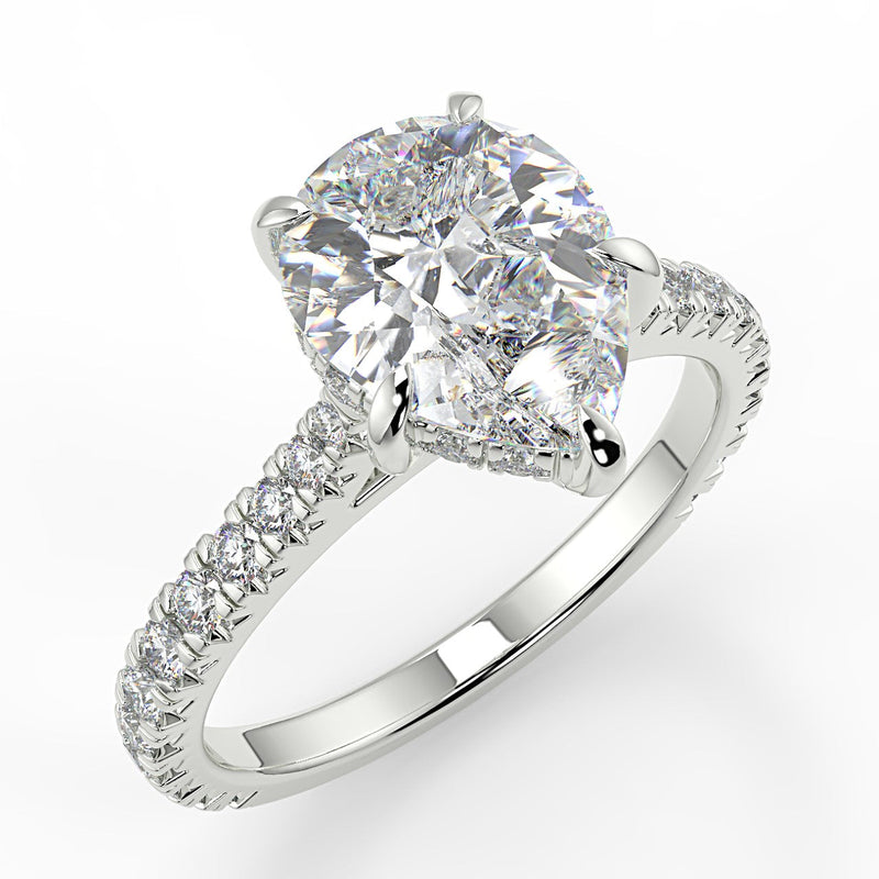 Hazel Pear lab diamon engagement ring with Cathedral shank and Single row French pave setting band
