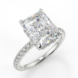 Valencia Elongated Radiant Cut Lab Diamond engagement ring with a reverse diamond seamless halo setting