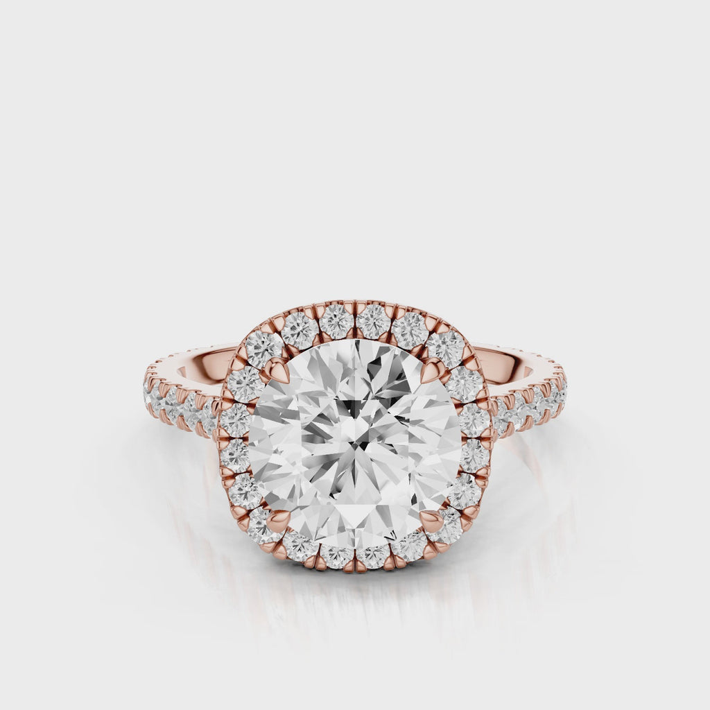 Mimosa Round cut lab diamond engagement ring with a cathedral setting and halo. French pave band video Rose Gold