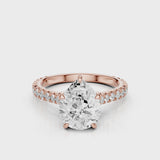 Hazel Pear lab diamon engagement ring with Cathedral shank and Single row French pave setting band video Rose Gold