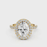 Raquel Oval lab diamond engagement ring. Non-cathedral, double edge seamless halo, single row French pave setting Yellow Gold
