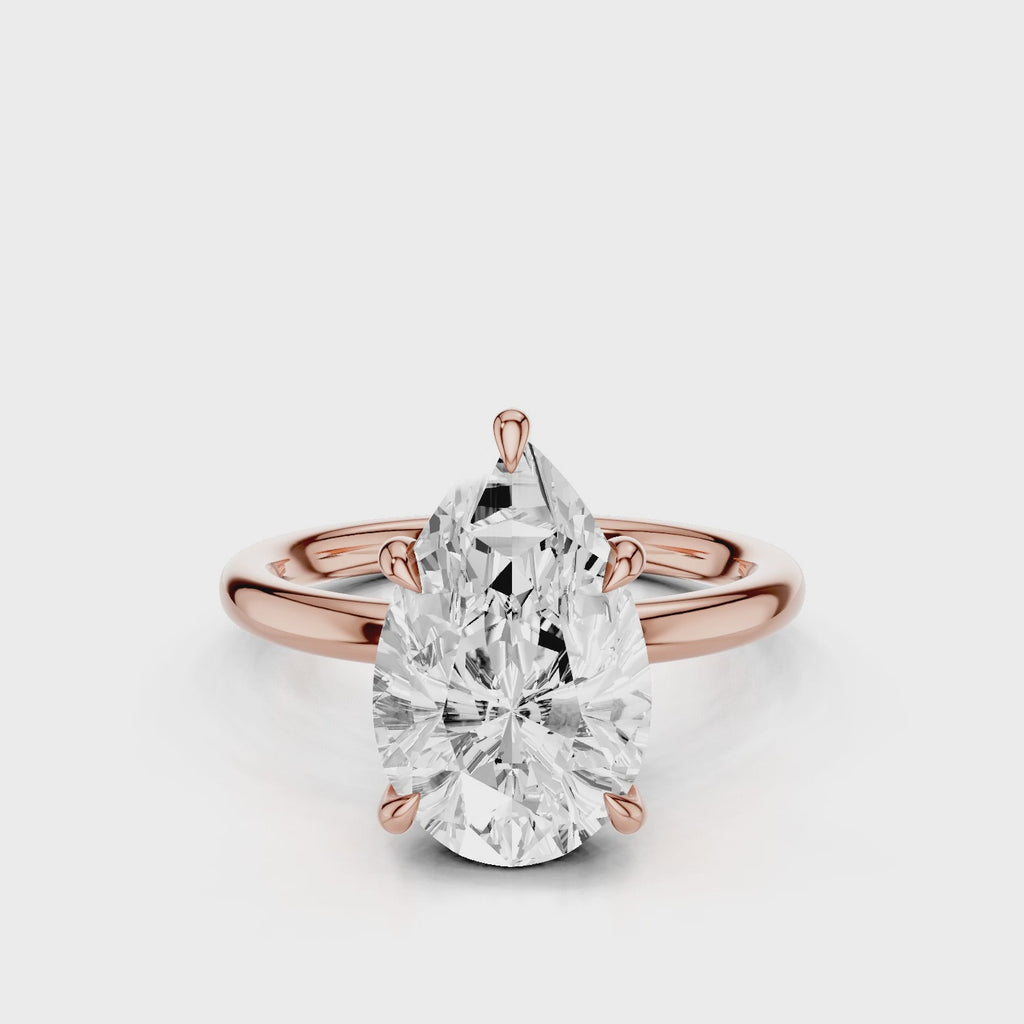 Audrey2 Pear lab diamond with noncathedral setting and plain band rose gold