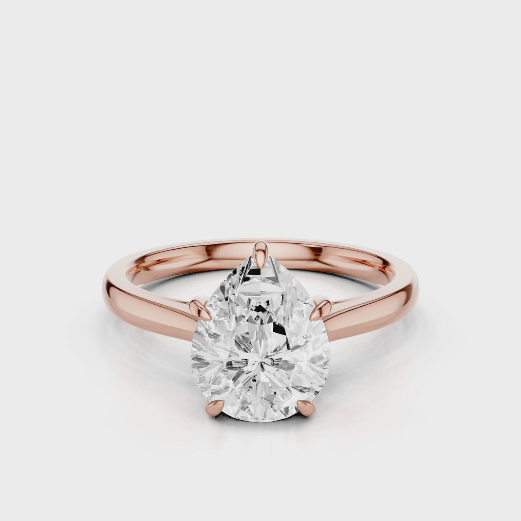 Thalia pear lab diamond engagement ring with Cathedral shank and plain tapered gold band video Rose Gold