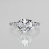 Larisa Cushion Lab Created Diamond Engagement Ringset in 4 prong cathedral
Setting with diamond reverse seamless halo and single row diamond French pave set diamond band video 