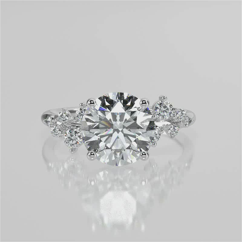 Vega Round cut lab diamond engagement ring with four prongs and Round accent diamonds video 