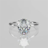  Jacqueline Oval lab diamond engagement ring with plain rounded band setting and a reverse halo 