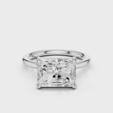 Elongated Radiant lab diamond engagement ring with east-west setting anf plain rounded band. Four prongs.  video White Gold