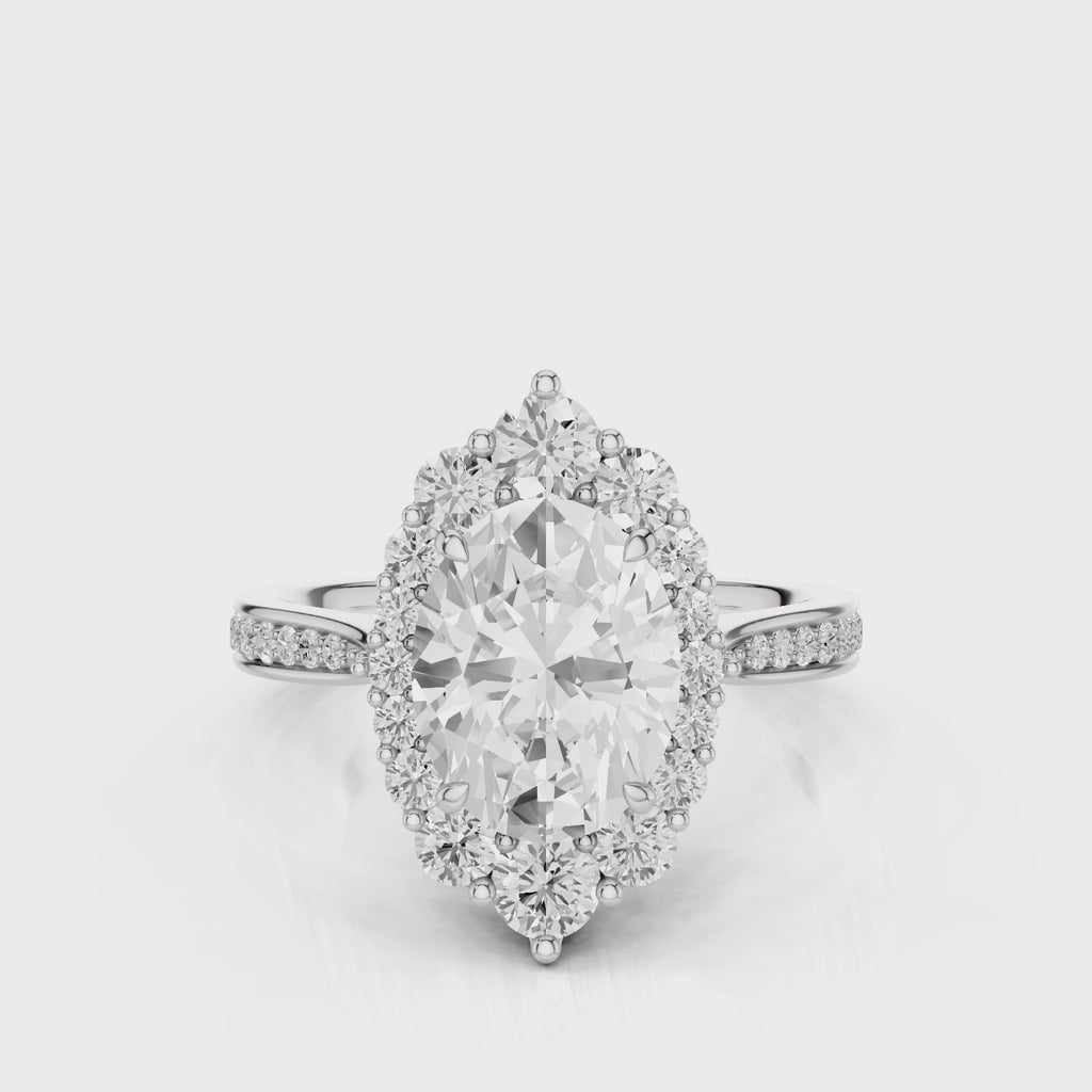 Antoinette Oval lab diamond engagement ring. Cathedral shank, seamless halo, side accents, diamond bead setting. White Gold
