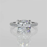 Violette Cushion Lab Created Diamond Engagement Ring with a bridge single row French pave band video 