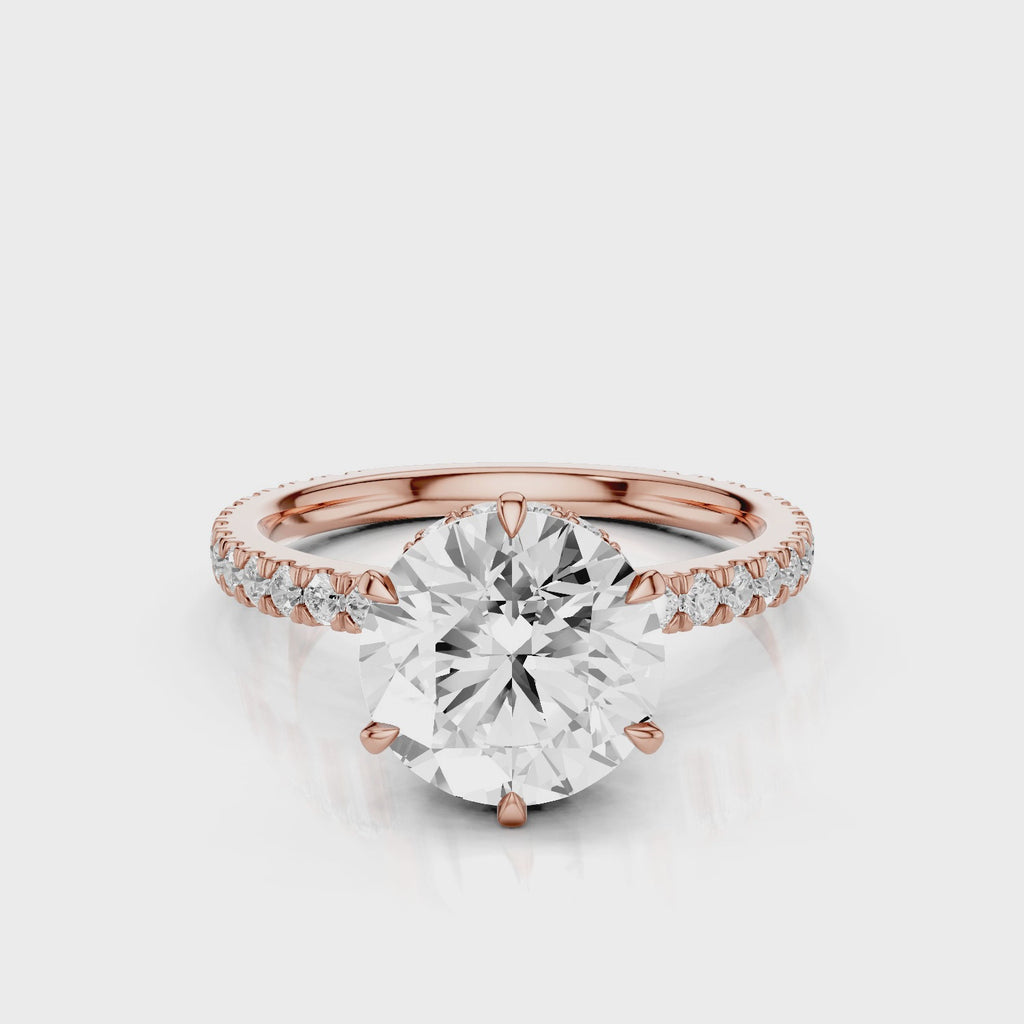 Sophie Round lab diamond engagement ring with reverse halo and french pave band. Rose Gold