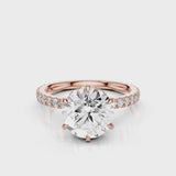 Sophie Round lab diamond engagement ring with reverse halo and french pave band. Rose Gold