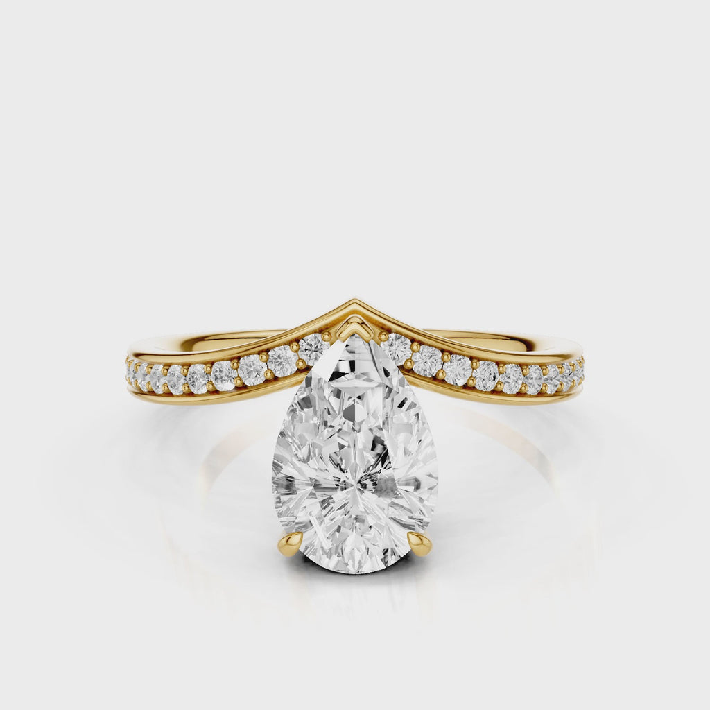 Tiara Pear lab diamont engagement ring with a V-shape design with bead setting accent diamonds video Yellow Gold