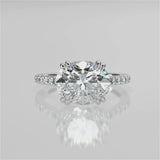 Nailah Oval lab diamond engagement ring in east west setting and tiger claw prongs and a french pave band video 