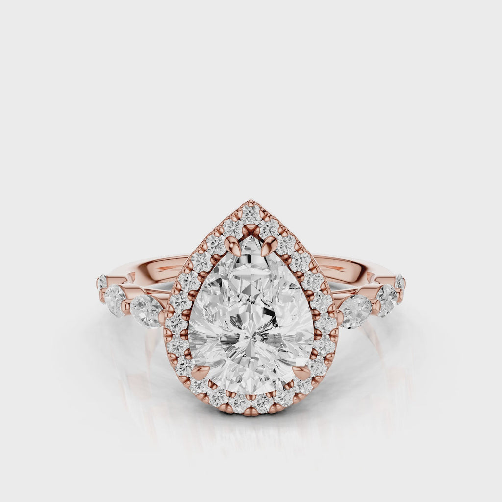 Eva Pear lab diamond engagement ring with cathedral shank and single seamless halo setting with the side marquise diamonds video Rose Gold