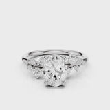 April Oval Lab diamond engagement ring with non cathedral setting and round accent stones White Gold