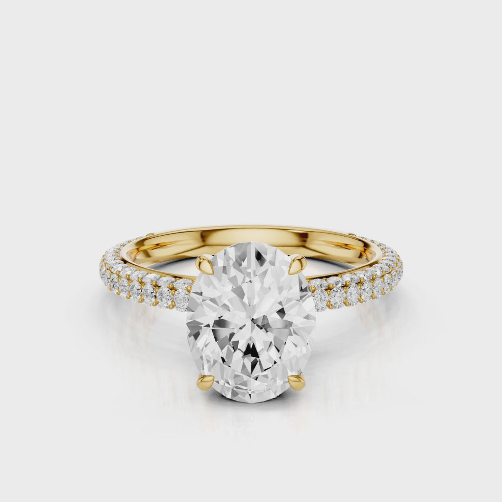 Charlotte Oval lab diamond engagement ring with three row french pave band and four prongs. Diamond gallery setting video  Yellow Gold