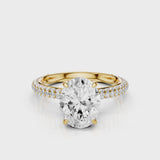 Charlotte Oval lab diamond engagement ring with three row french pave band and four prongs. Diamond gallery setting video  Yellow Gold