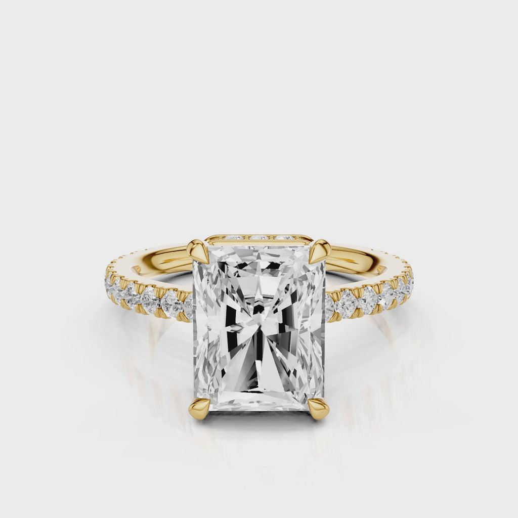 Marseille Elongated radiant cut centre stone with pave set lab grown diamonds video Yellow Gold