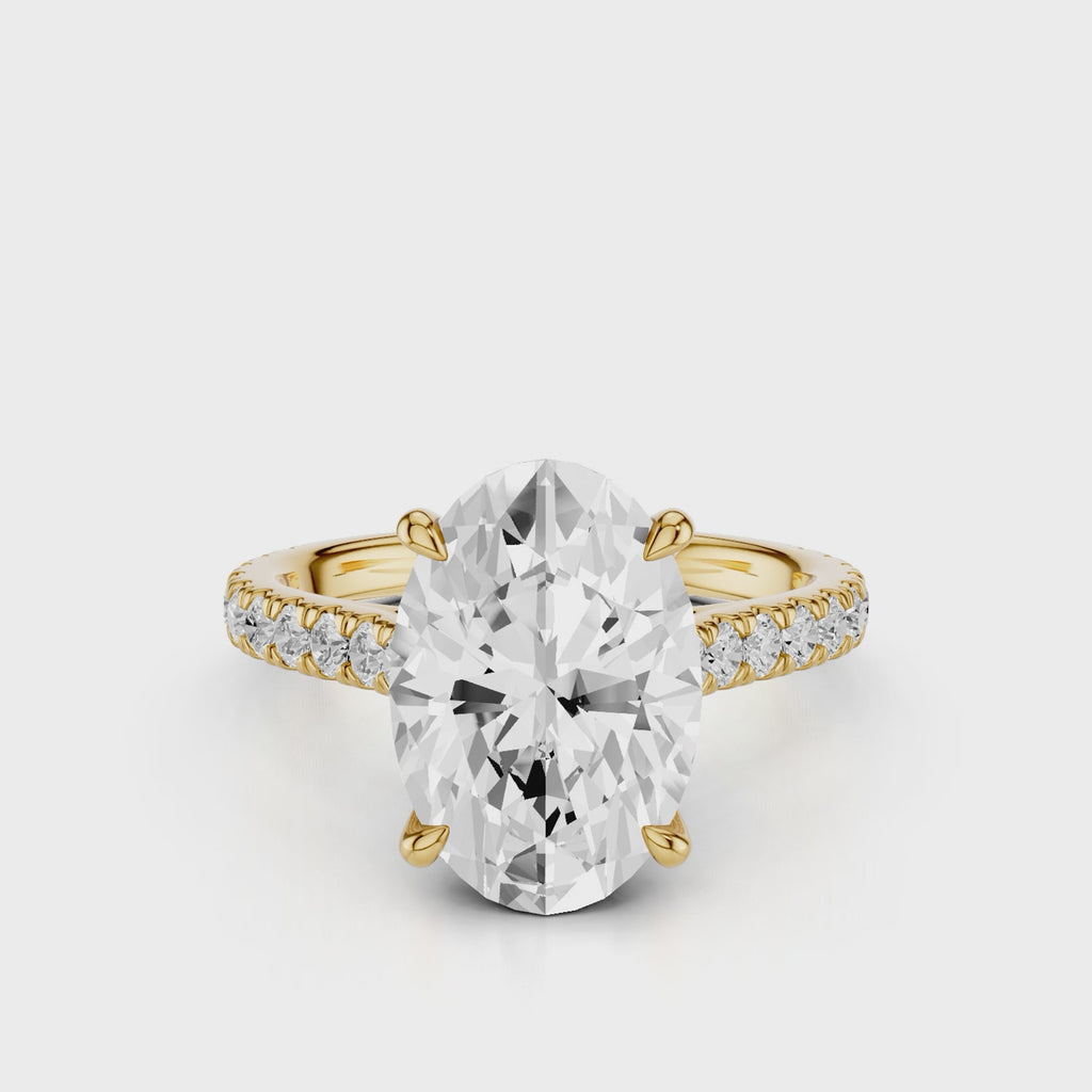 Noel Cathedral Oval Diamond Engagement RIng with French Pave setting Yellow Gold