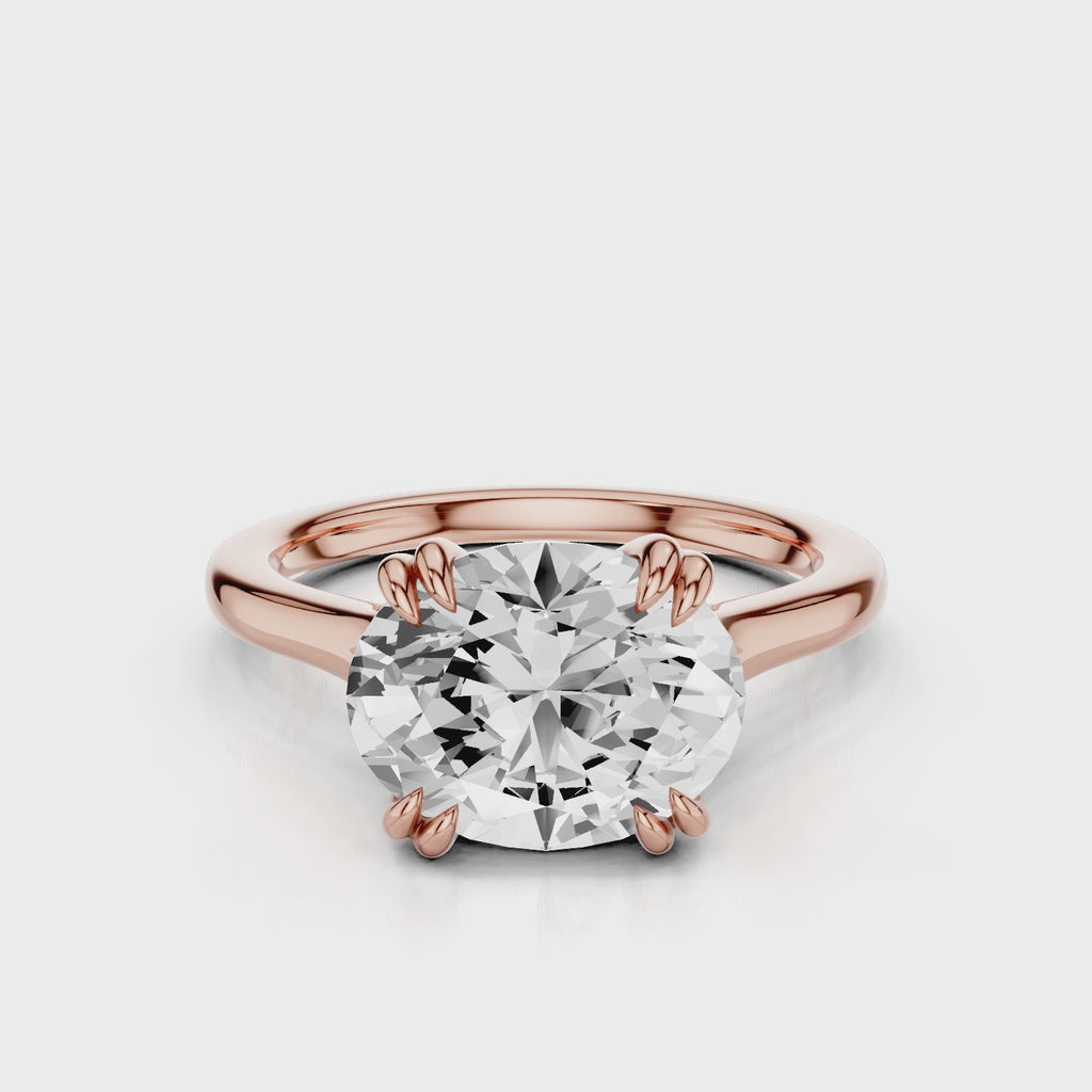 Nailah Oval East West solitaire ring with claw prongs Rose Gold
