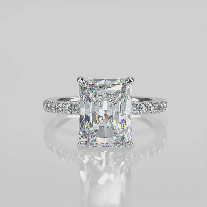 Valencia Elongated Radiant Cut Lab Diamond engagement ring with a reverse diamond seamless halo setting