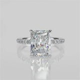 Valencia Elongated Radiant Cut Lab Diamond engagement ring with a reverse diamond seamless halo setting