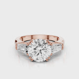 Glada Round cut lab diamond engagement ring with tiger claw prongs and tapered baguettes video  Rose Gold