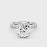 Sophie Round lab diamond engagement ring with reverse halo and french pave band