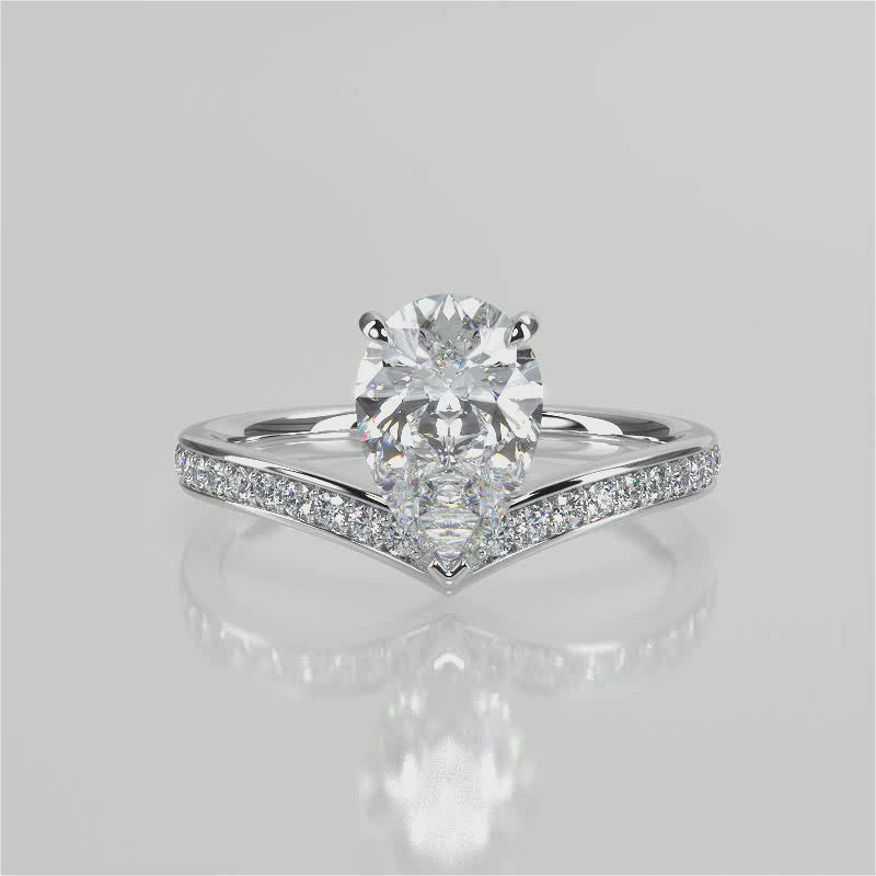 Tiara Pear lab diamont engagement ring with a V-shape design with bead setting accent diamonds video 