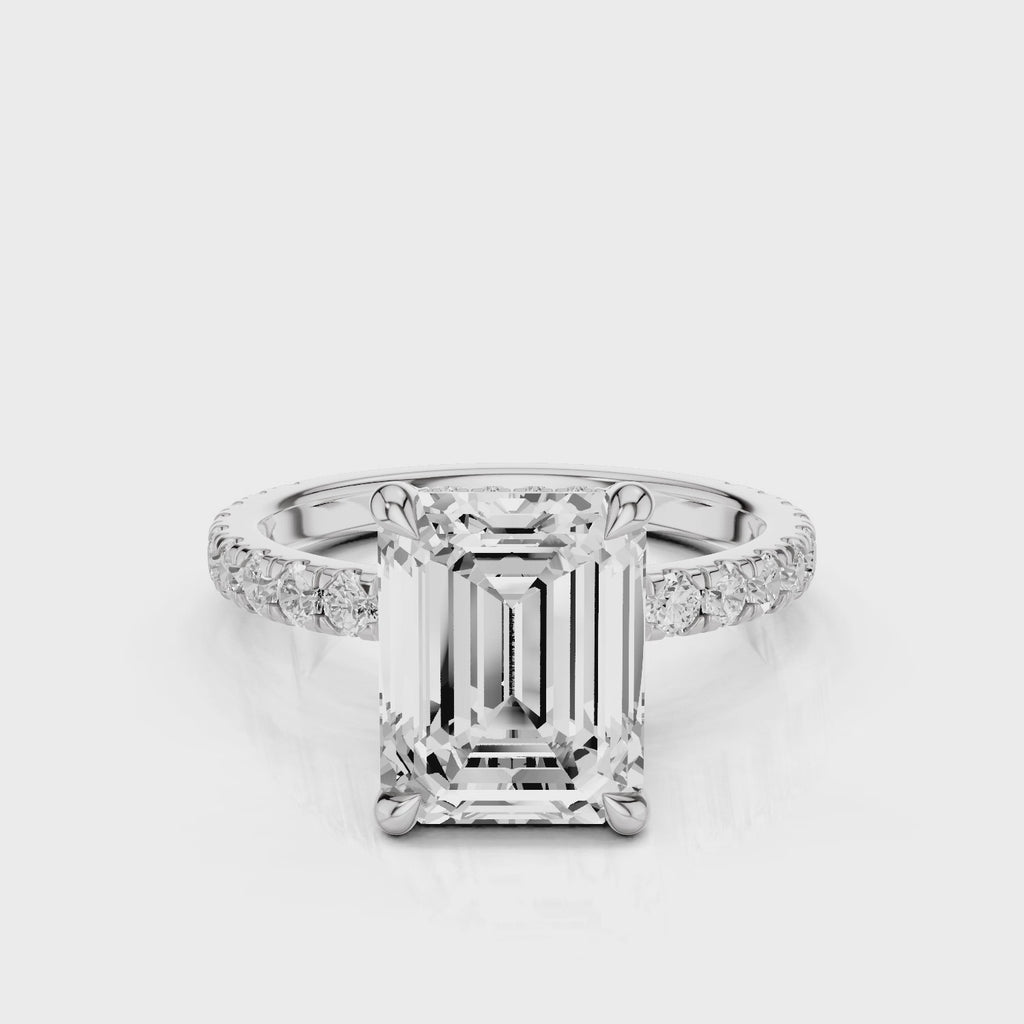 Mira Emerald lab diamond engagement ring. Non-cathedral shank, single row french pave setting band with a 4 prongs setting video White Gold