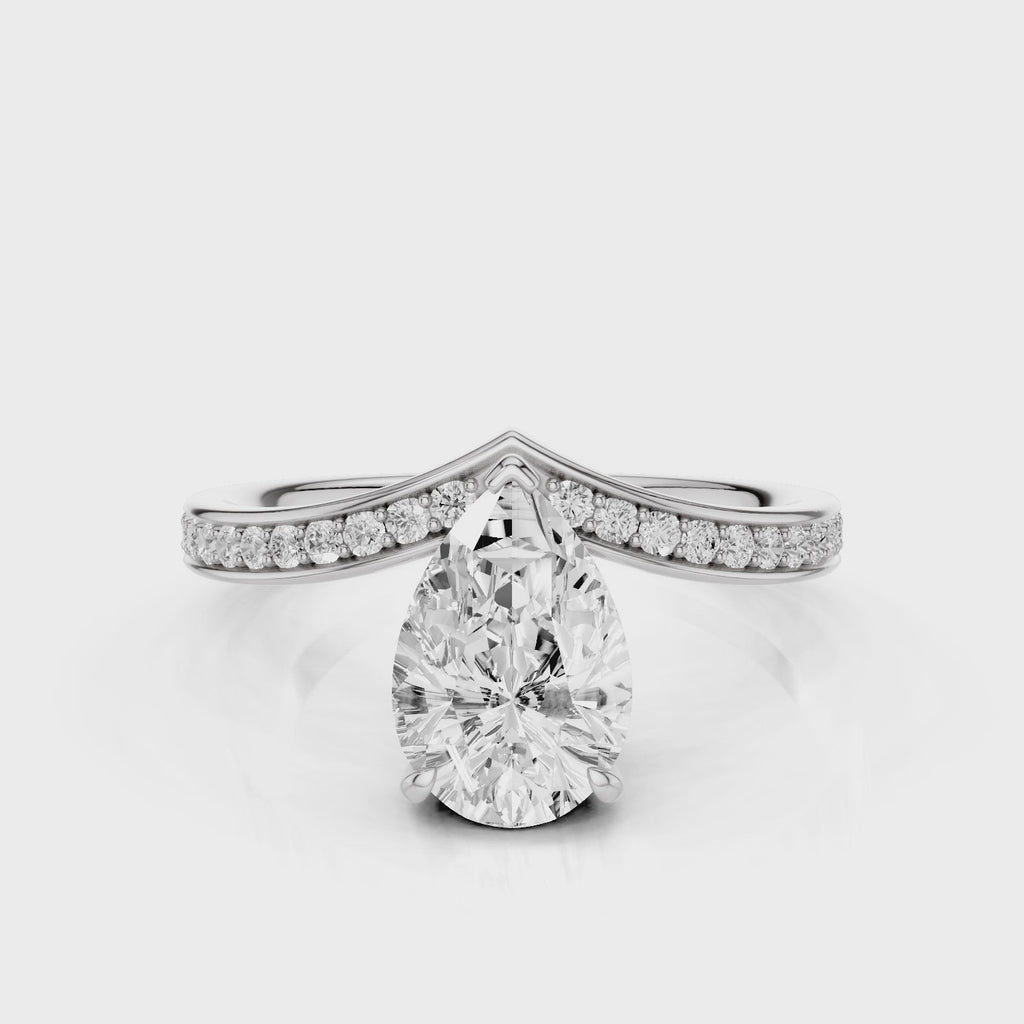 Tiara Pear lab diamont engagement ring with a V-shape design with bead setting accent diamonds video White Gold