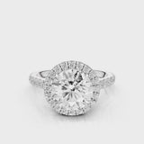 Milena Round cut lab diamond engagement ring. Seamless halo cathedral setting, French pave diamond band video White Gold