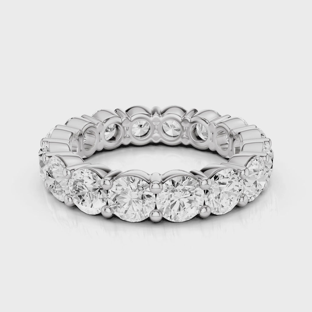 Angel eternity wedding band with round stones 