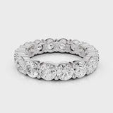 Angel eternity wedding band with round stones 