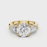 Glada Round cut lab diamond engagement ring with tiger claw prongs and tapered baguettes video  Yellow Gold