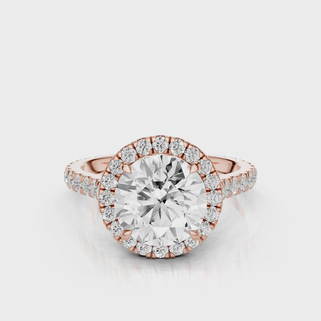 Milena Round cut lab diamond engagement ring. Seamless halo cathedral setting, French pave diamond band video Rose Gold