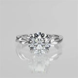 A twisted vine engagement ring with a lab created diamond center stone set in a white gold band video 