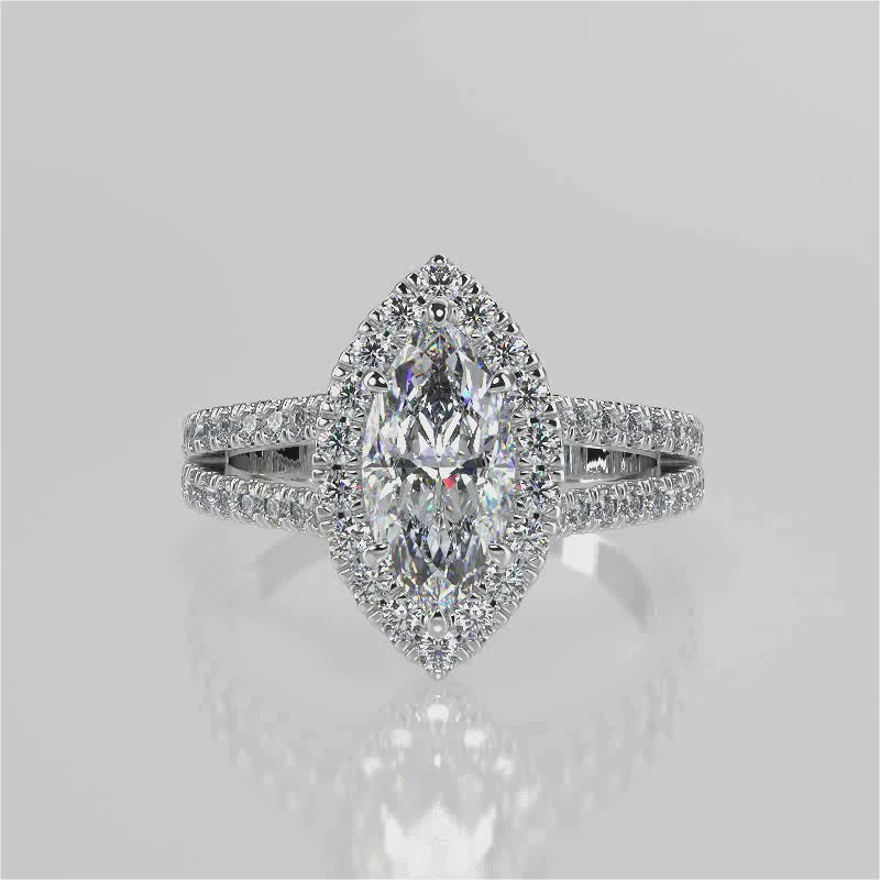 Margaret Marquise Lab Diamond Engagement Ring with single diamond halo with a cathedral set diamond split band set in French pave band video 