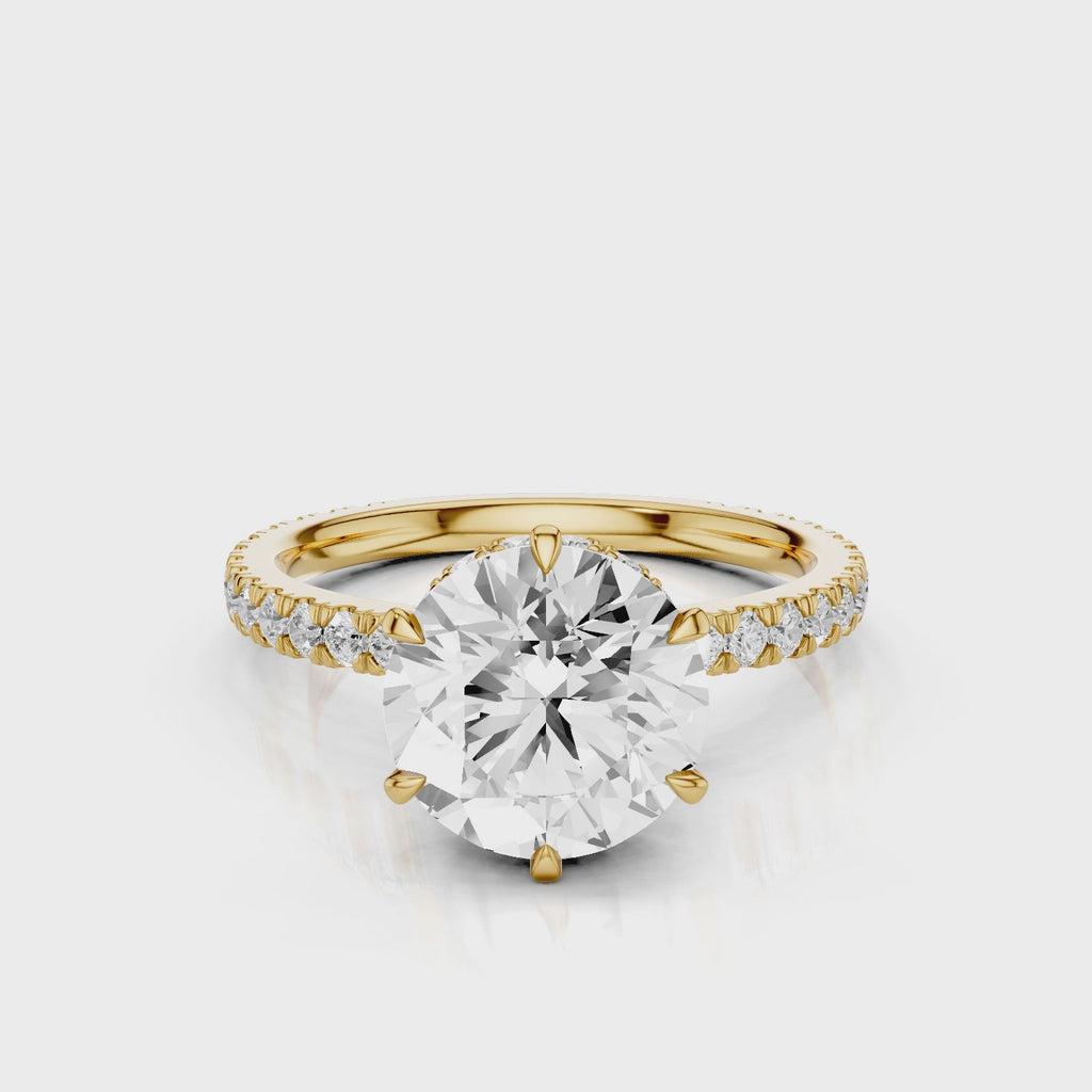 Sophie Round lab diamond engagement ring with reverse halo and french pave band. Yellow Gold
