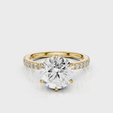Sophie Round lab diamond engagement ring with reverse halo and french pave band. Yellow Gold
