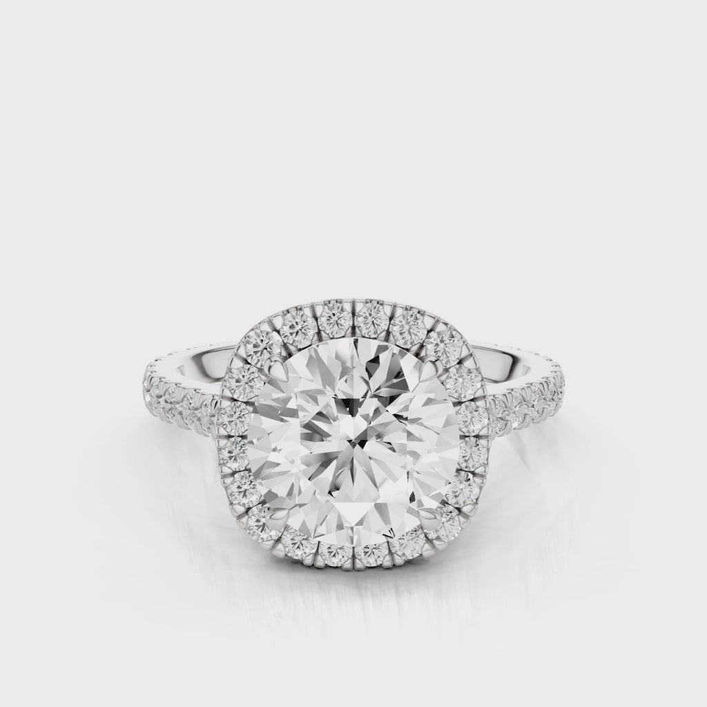 Mimosa Round cut lab diamond engagement ring with a cathedral setting and halo. French pave band video White Gold